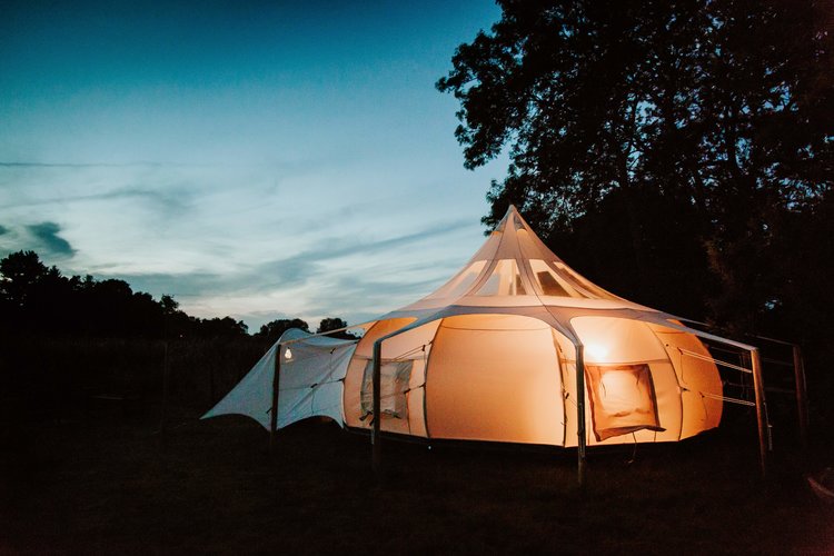Stargazer Tents - innovative, luxury bell tents, with lots of standing room & genious transparent roof panels, so you can stargaze from the comfort of your tent. Lotus Belle